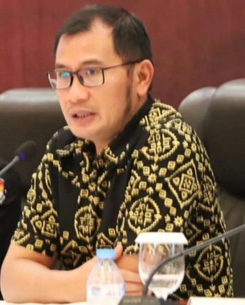 Dr Ferry Daud Liando SSos, MSi