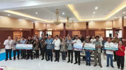 Akselerasi Ekonomi Sektor Perikanan Bitung, BSG Bersama OJK dan Pemkot Bitung Tandatangani MoU Program Pengembangan Ekonomi Daerah